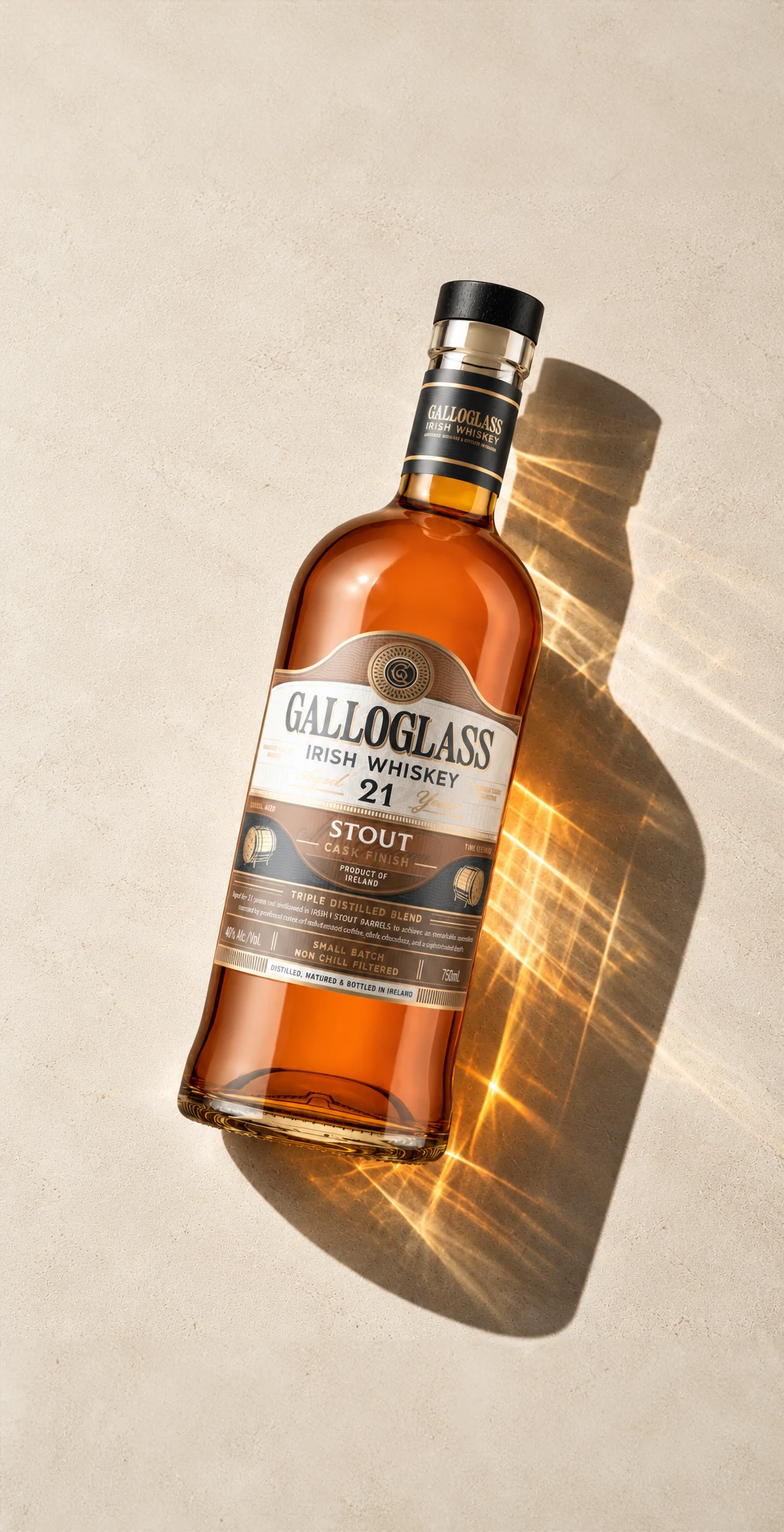 Galloglass 21 Year Stout Cask bottle lying in sunlight